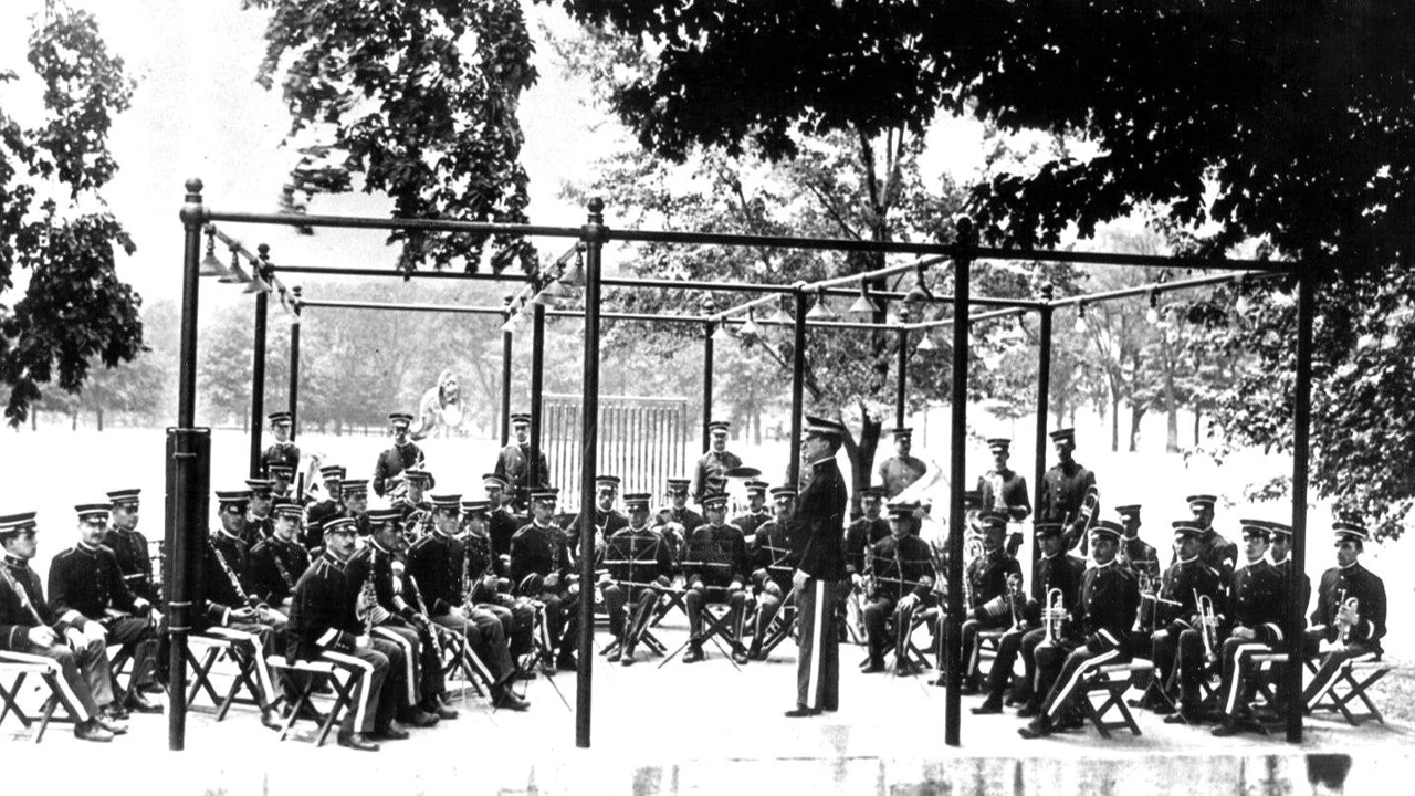 Teacher of Music Philip Egner conducting the band at the Superintendents Quarters in 1914.