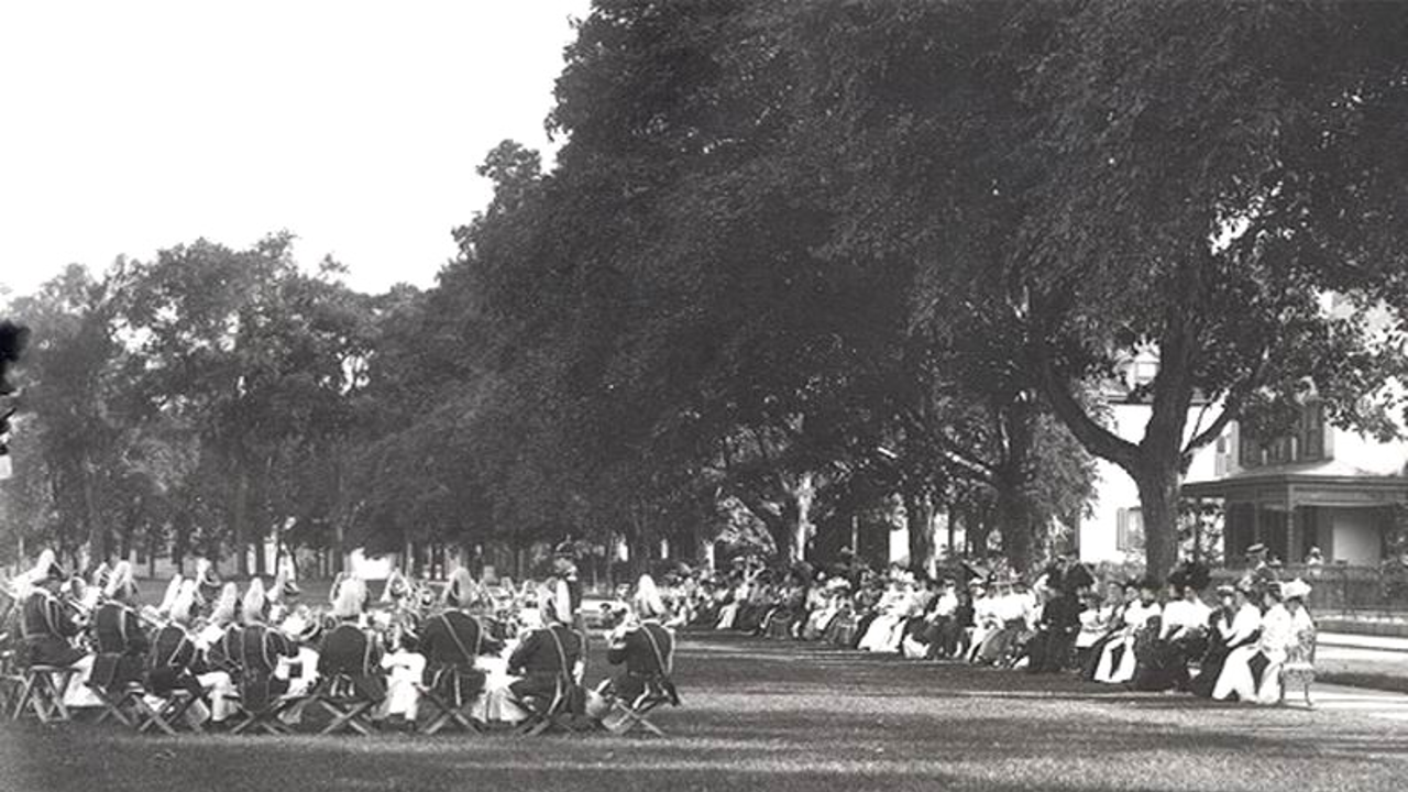 Band in 1889 seated in a ‘serenade’ band setup across from the Superintendent’s Quarters.